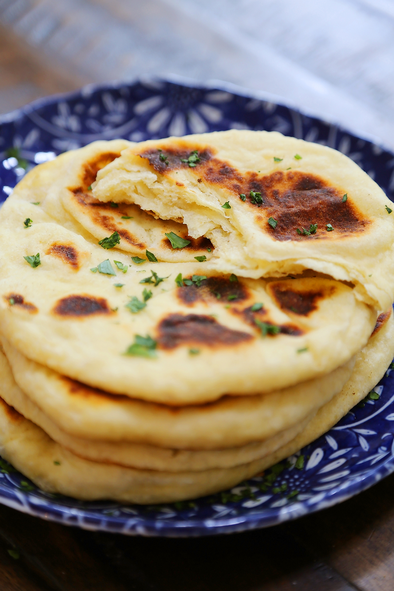 Homemade Naan (Soft Flatbread) - Soft, buttery and EASY flatbread made with only pantry ingredients! thecomfortofcooking.com