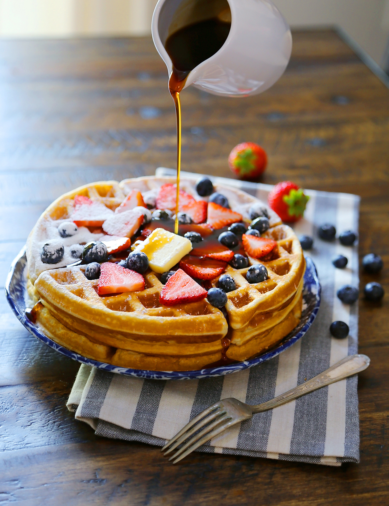 Fluffy Belgian Waffles - The BEST soft-yet-crisp, thick Belgian waffles made easy at home. thecomfortofcooking.com
