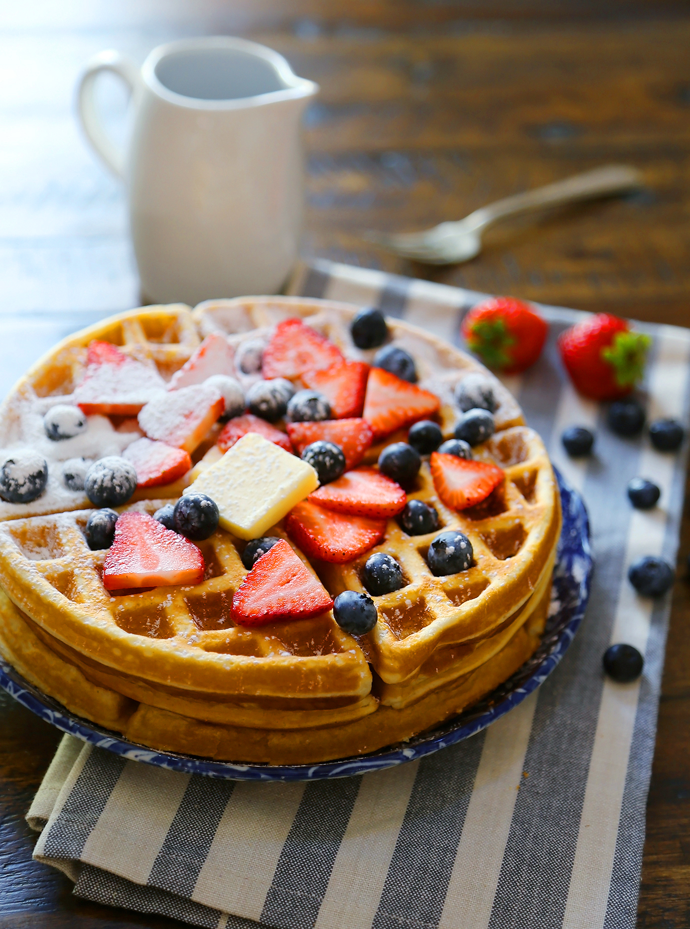 Fluffy Belgian Waffles - The BEST soft-yet-crisp, thick Belgian waffles made easy at home. thecomfortofcooking.com