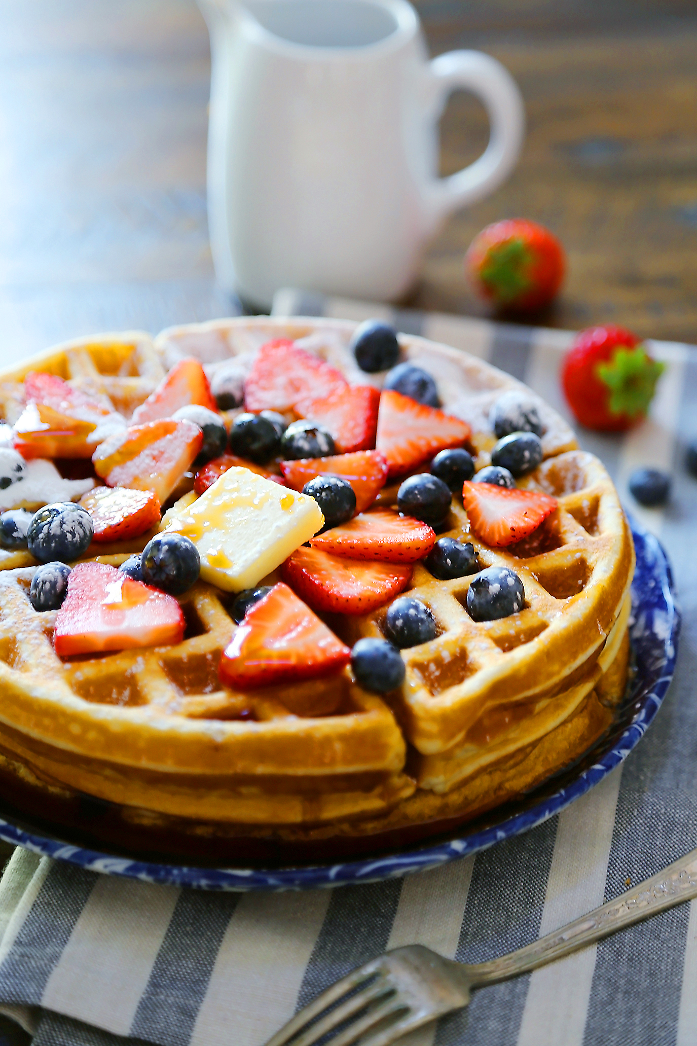 Fluffy Belgian Waffles - The BEST soft-yet-crisp, thick Belgian waffles made easy at home. thecomfortofcooking.com