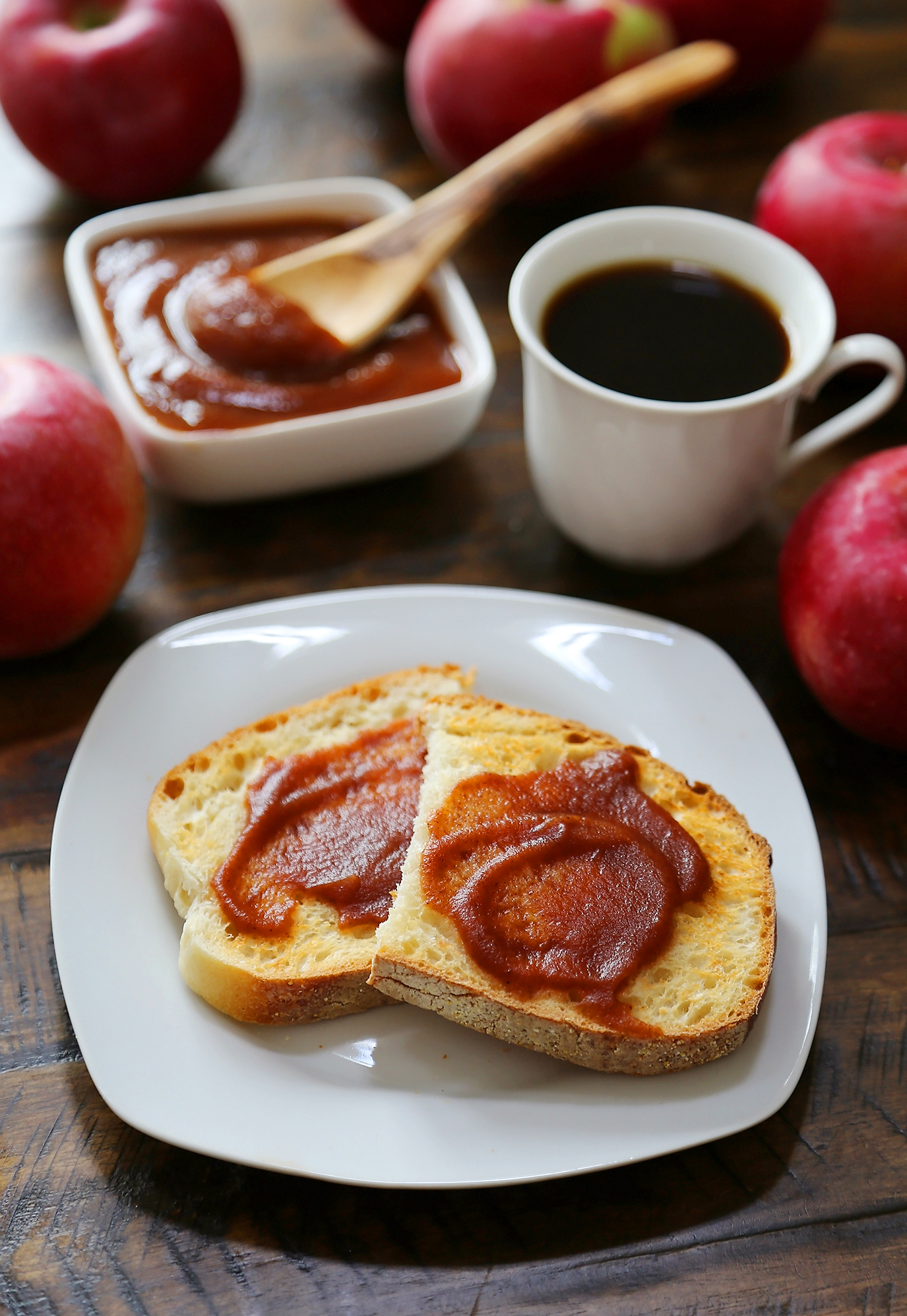 Slow Cooker Apple Butter - Smooth, velvety spread made with fresh apples + warm spices! Thecomfortofcooking.com