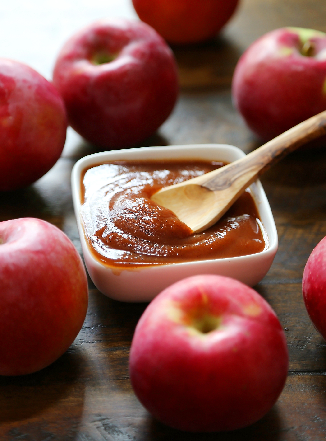 Slow Cooker Apple Butter - Smooth, velvety spread made with fresh apples + warm spices! Thecomfortofcooking.com