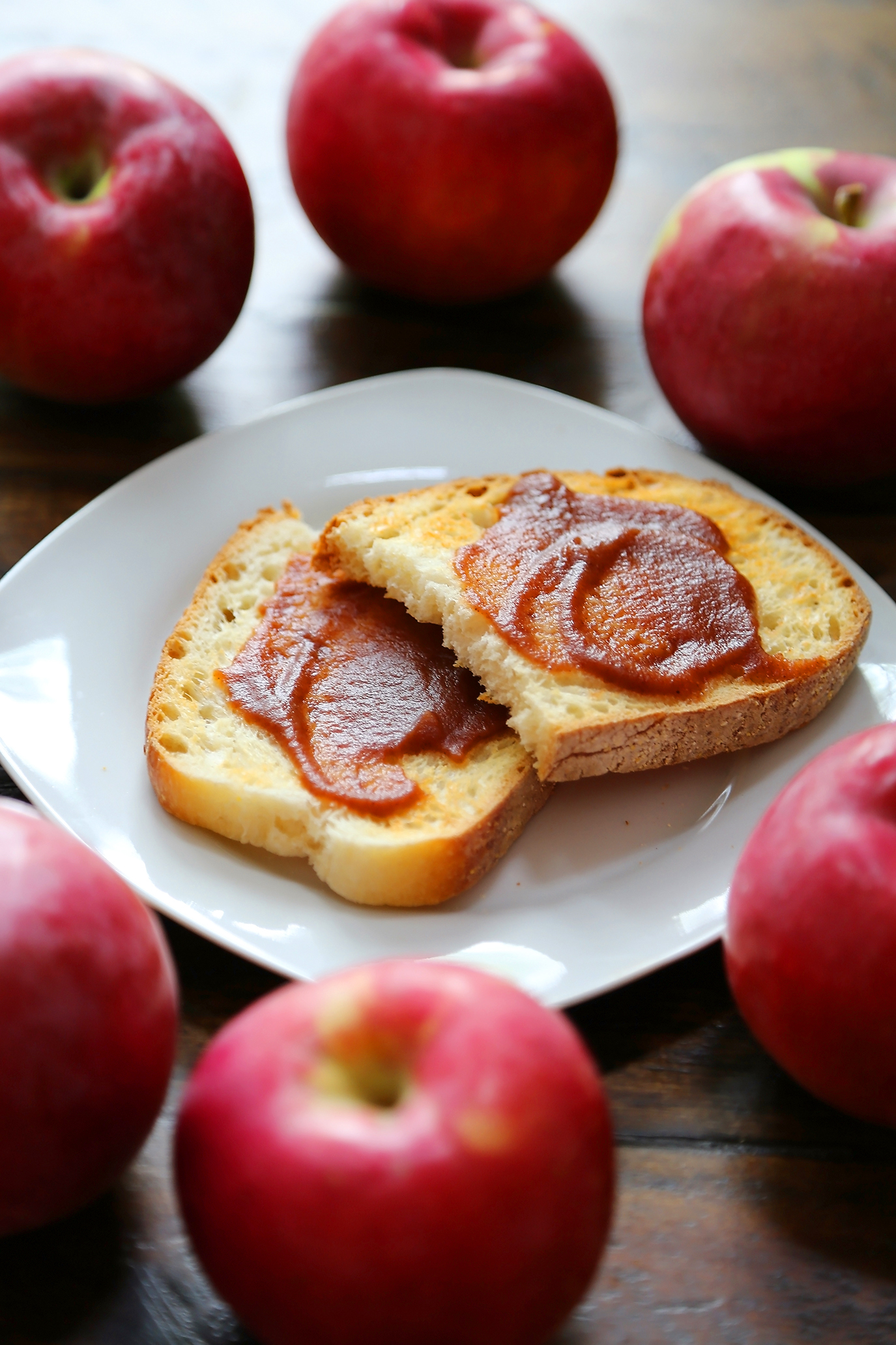 Slow Cooker Apple Butter - Smooth, velvety spread made with fresh apples + warm spices! Thecomfortofcooking.com