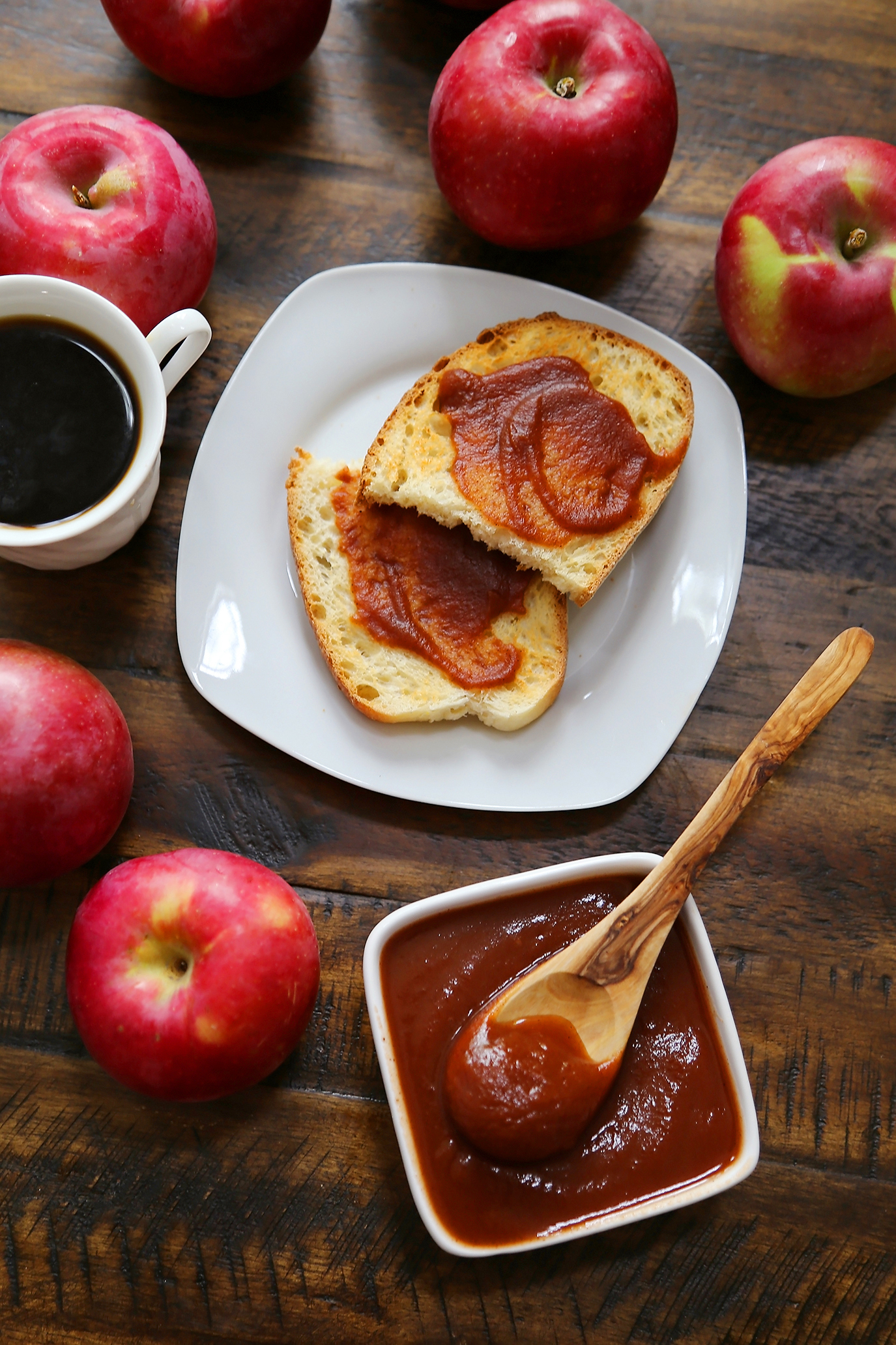 Slow Cooker Apple Butter - Smooth, velvety spread made with fresh apples + warm spices! Thecomfortofcooking.com