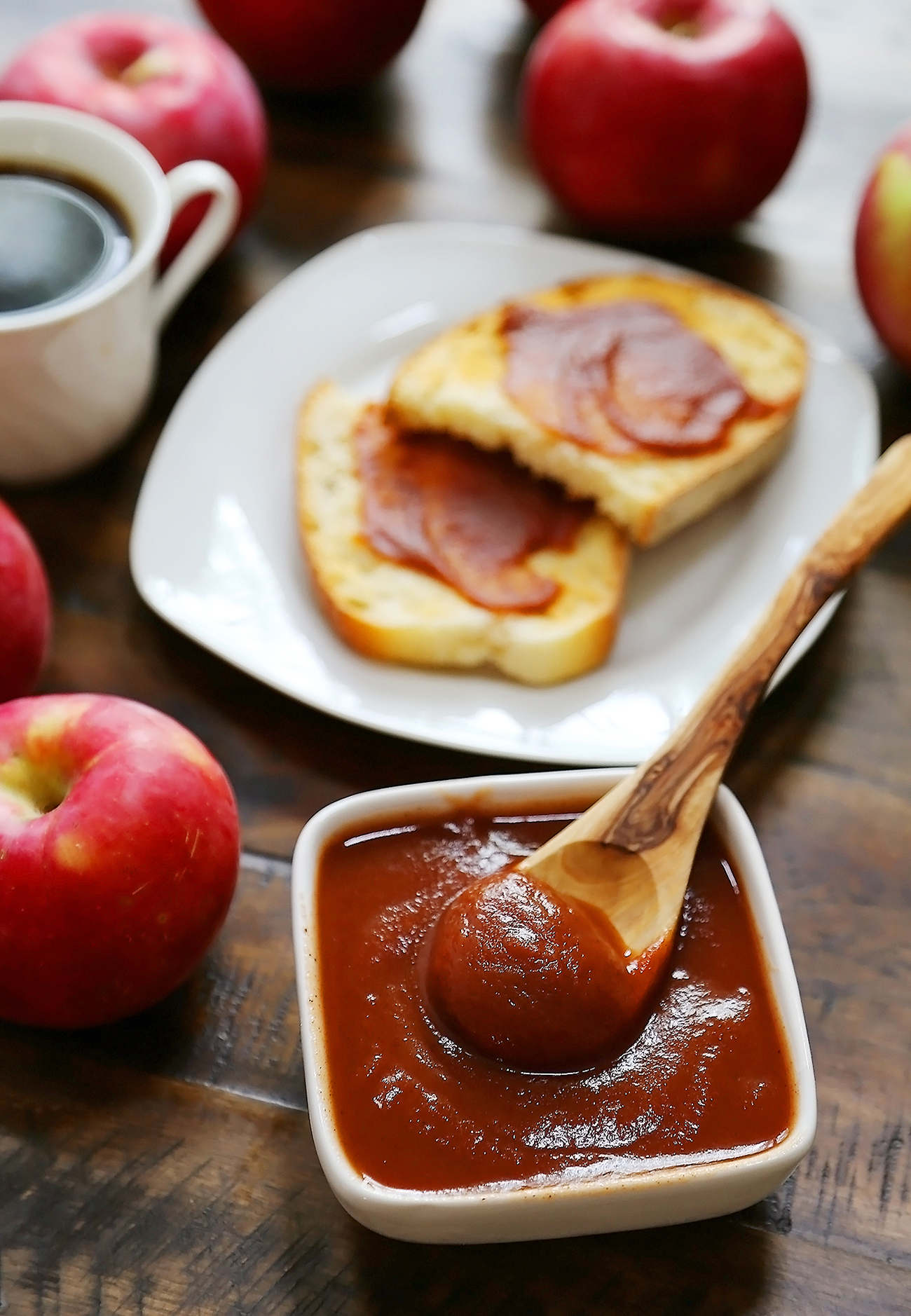 Slow Cooker Apple Butter - Smooth, velvety spread made with fresh apples + warm spices! Thecomfortofcooking.com