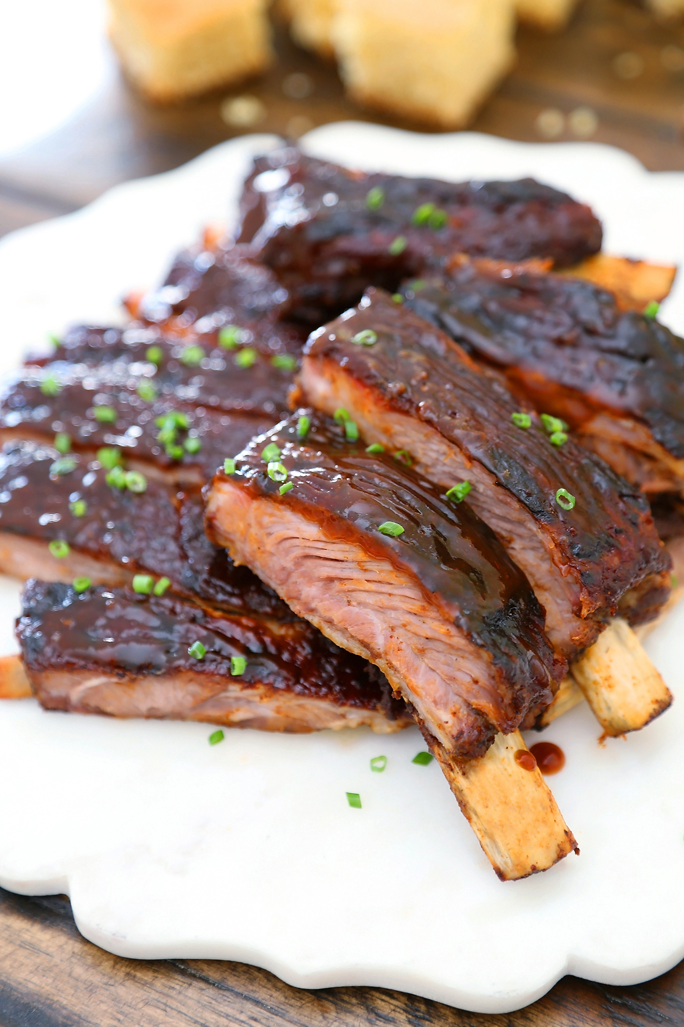 Sticky BBQ Spareribs - Melt-in-your-mouth, saucy BBQ spare ribs made in under 30 minutes! thecomfortofcooking.com