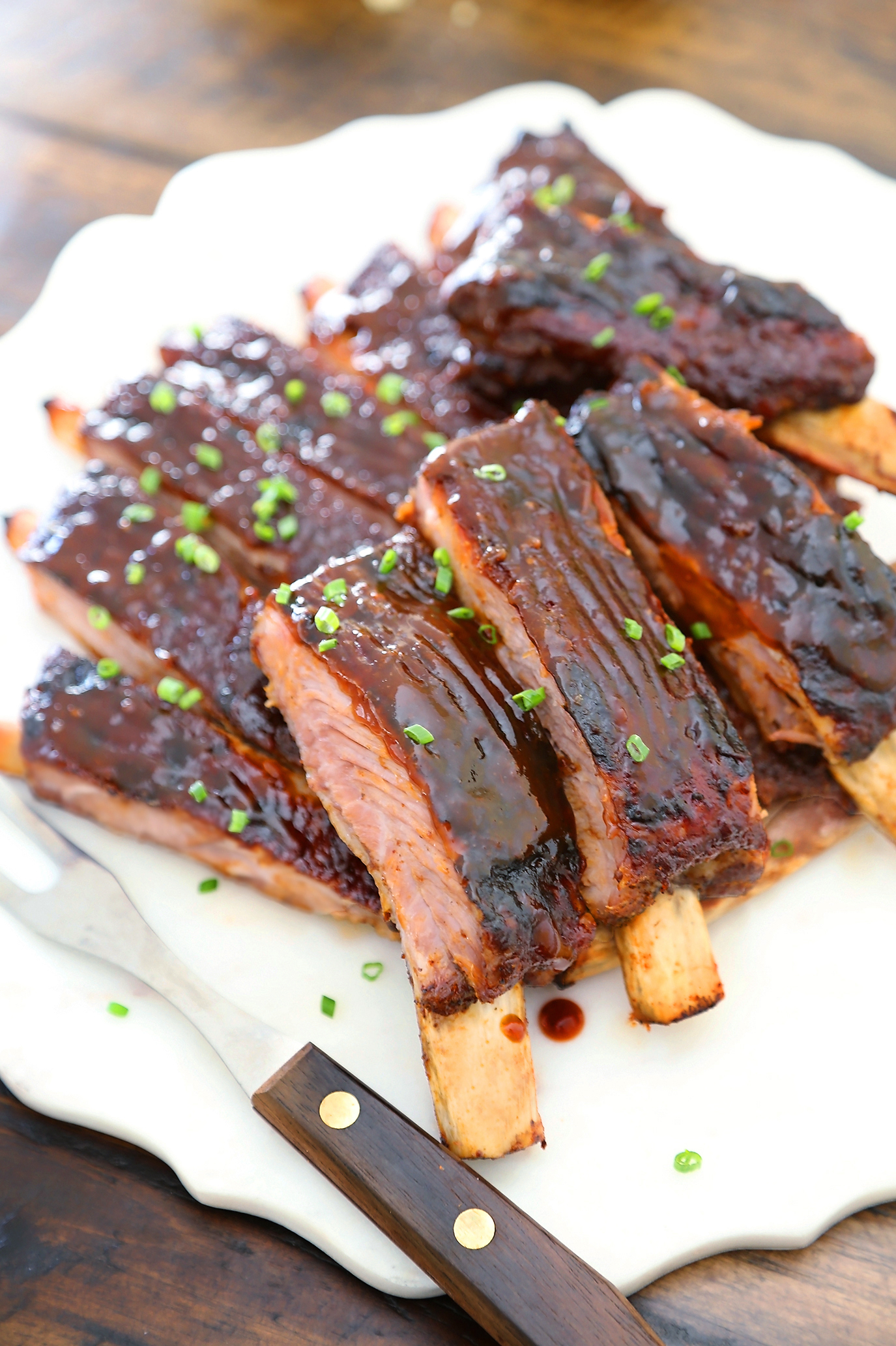 Sticky BBQ Spareribs - Melt-in-your-mouth, saucy BBQ spare ribs made in under 30 minutes! thecomfortofcooking.com