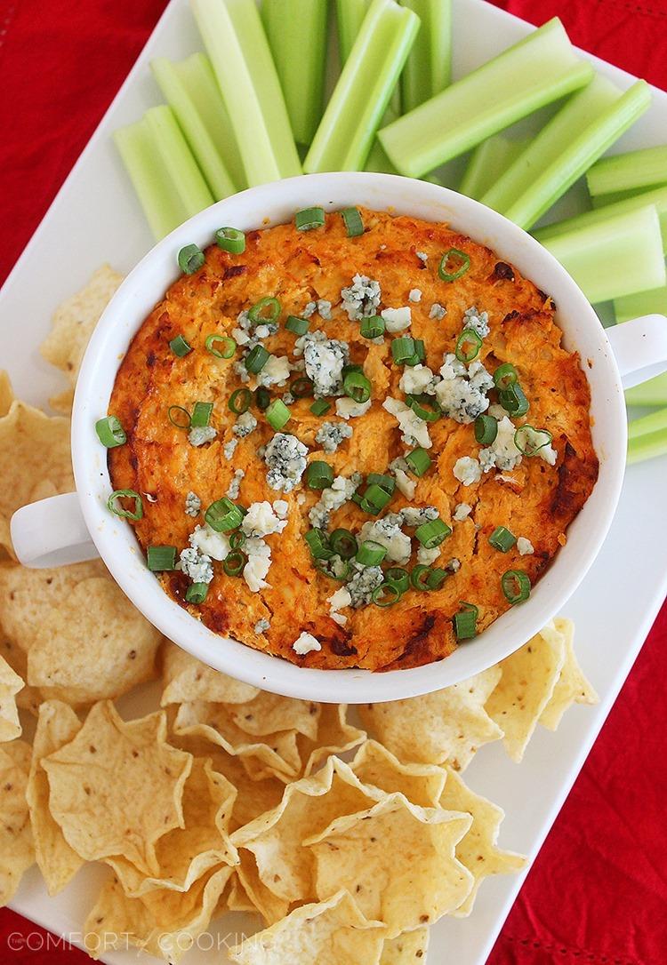 Cheesy Buffalo Chicken Dip – Try this creamy, cheesy buffalo chicken dip for game day, or any day! Totally scrumptious and simple to make in the oven, on the stovetop, or in your slow cooker | thecomfortofcooking.com