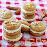 Snickerdoodle Sandwich Cookies with Coconut Cream Cheese Frosting - Super soft, buttery cinnamon-sugar cookies with a tangy coconut cream cheese frosting! Fun for kids to make and SO delicious! thecomfortofcooking.com