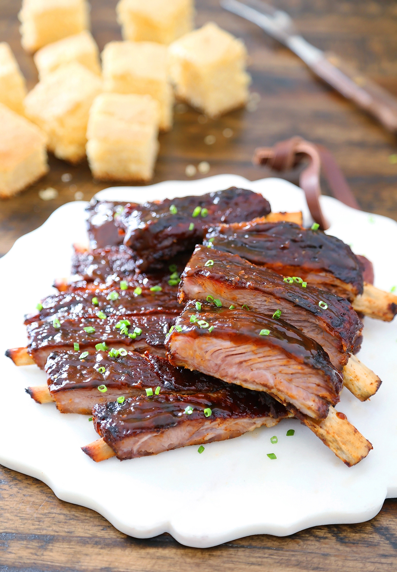 Sticky BBQ Spareribs - Melt-in-your-mouth, saucy BBQ spare ribs made in under 30 minutes! thecomfortofcooking.com